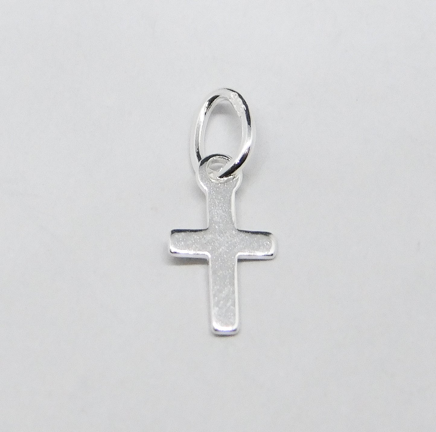 CROSS CHARM WITH RING 5x9MM